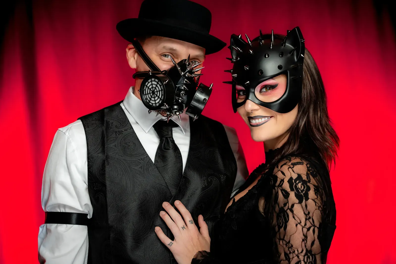 Detail shot of gold masks on a velvet table.